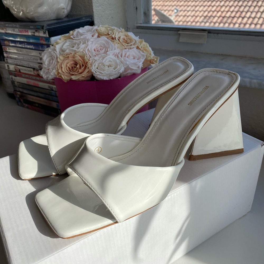 White kitten heels